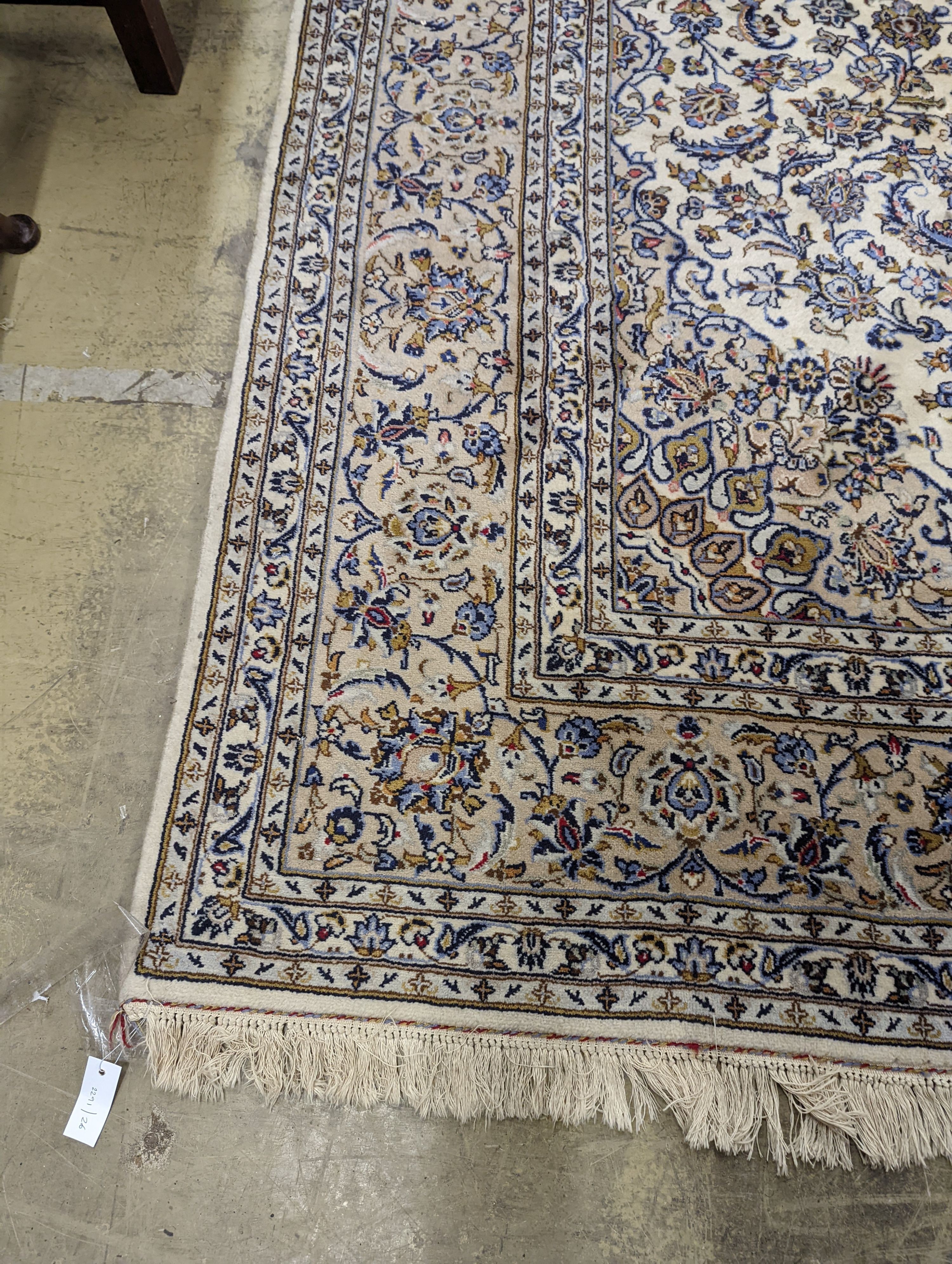 A Nain ivory ground carpet, 315 x 214cm